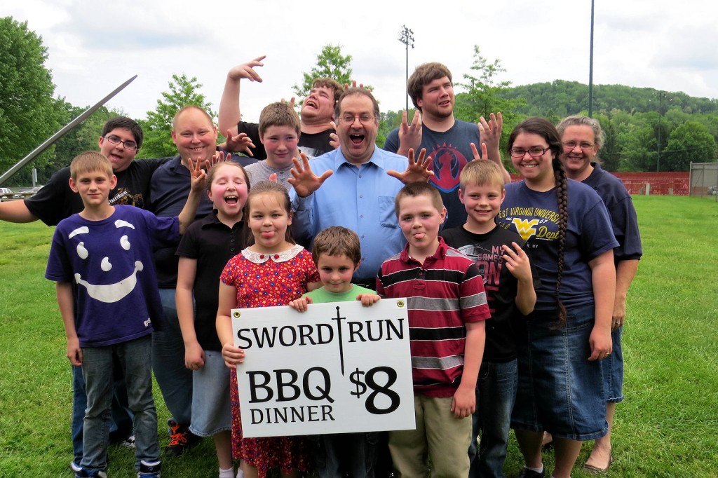 Sword Run - Kids hamming it up for reporter