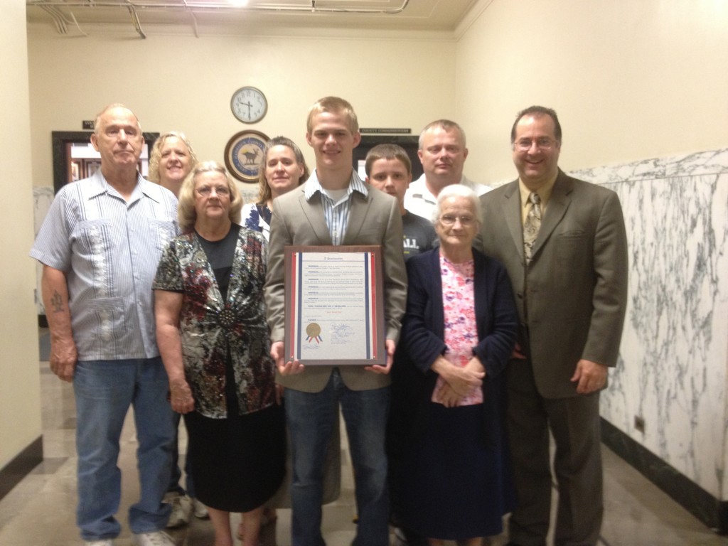 Zach with family and his pastor (yours truly) at Harrison County Courthouse, just after receiving plaque proclaiming July 11, 2013 as "Zach Sandy Day."